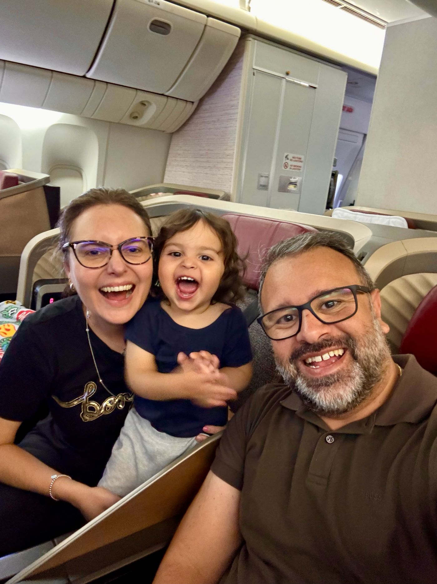 Fernando com a família no voo para Orlando